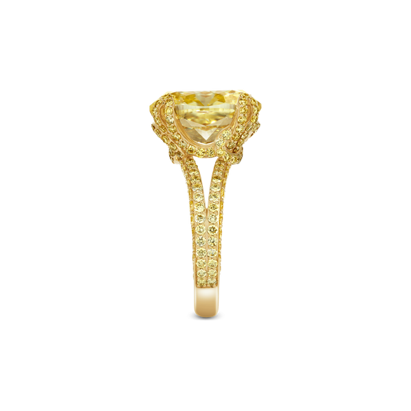 The Only Oval Fancy Yellow Diamond Engagement Ring with Half-Pavé Band